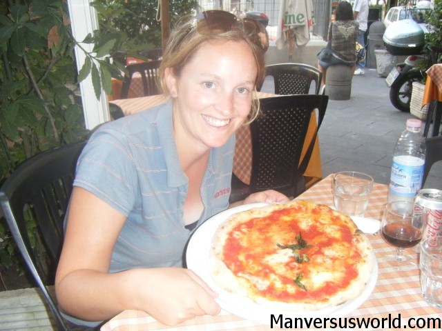 My girlfriend Nic enjoying a pizza in Naples, Italy