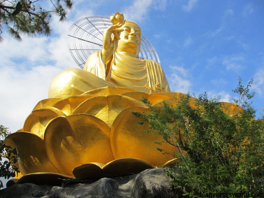 A fat yellow Buddha in Dalat, Vietnam