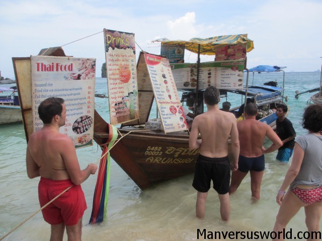 A food boat on Railay Beach in Thailand